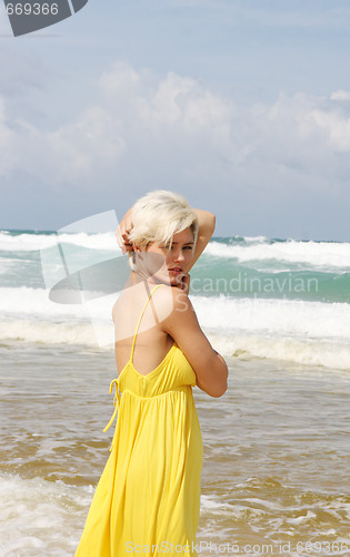 Image of Blond woman at the beach.