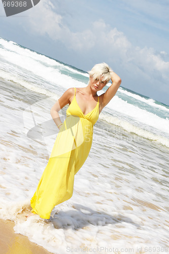 Image of Blond woman at the beach.