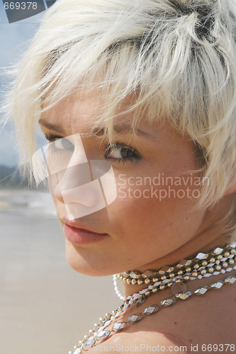 Image of Blond woman at the beach.