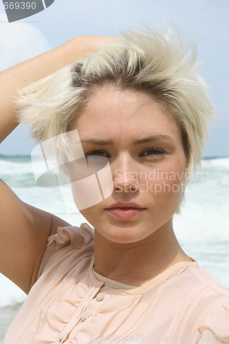 Image of Blond woman at the beach.