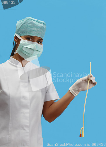 Image of Nurse holding an urinary catheter