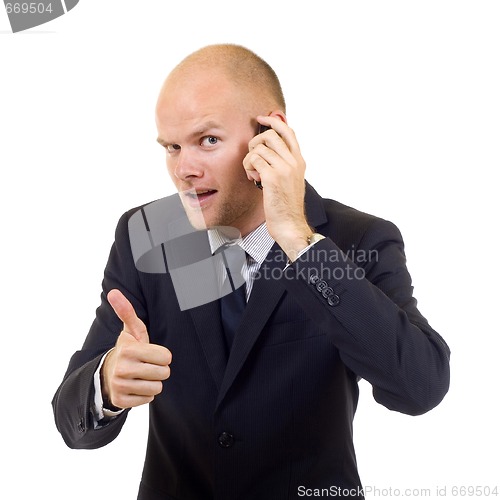 Image of Portrait Of A Young Businessman On The Phone