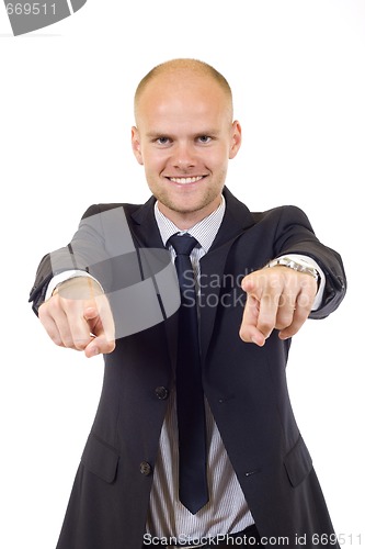 Image of young businessman pointing to you 