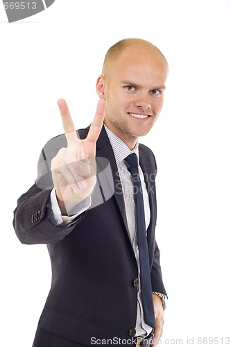 Image of Very happy successful gesturing businessman