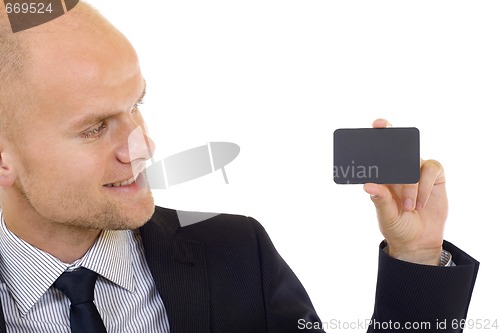 Image of Business man handing a blank business card