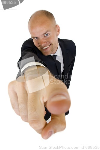 Image of businessman pointing at camera