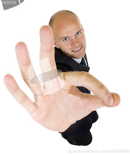 Image of Businessman giving OK gesture