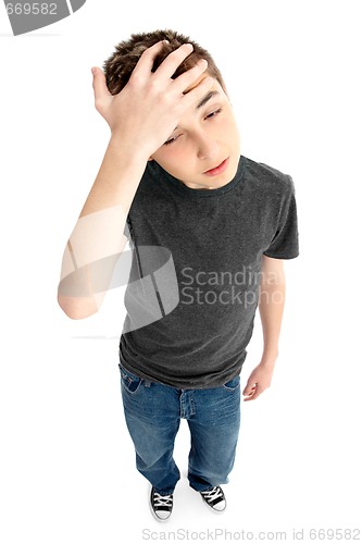 Image of Worried tired stressed or frustrated boy