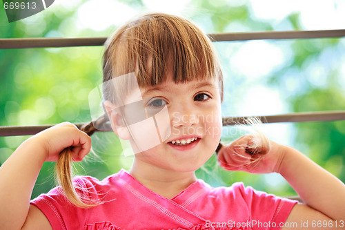 Image of Little girl with two plaits