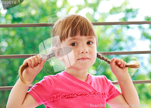 Image of Little girl with two plaits