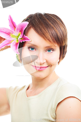 Image of Positive woman with flower
