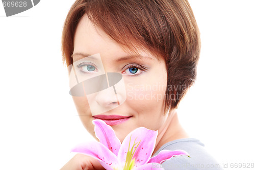Image of Elegant woman with flower