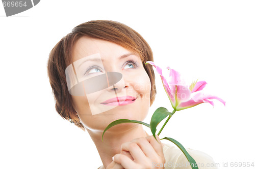 Image of Happy woman with flower