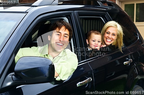 Image of Happy family in car