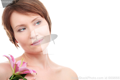 Image of Healthy woman with flower