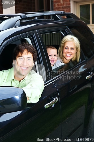 Image of Happy family in car