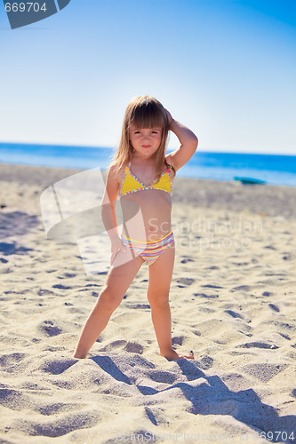 Image of Funny girl on a beach