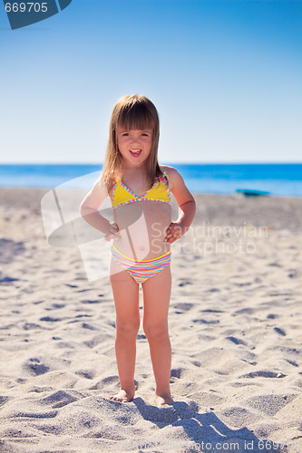 Image of Funny girl on a beach