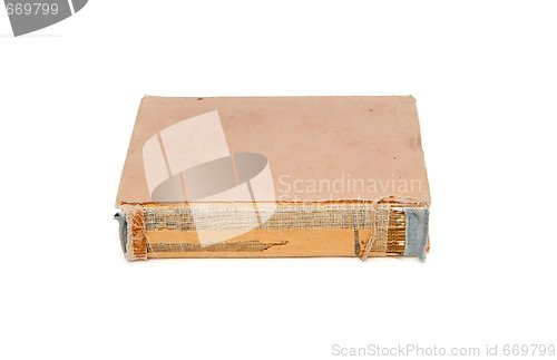 Image of Old tatty book with torn out cover back isolated