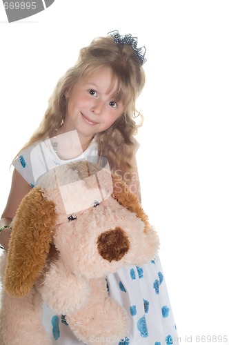 Image of Little girl playing with toy