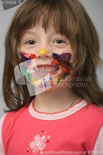 Image of little girl with paint on face