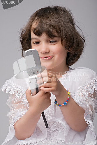 Image of cute girl with mobile phone