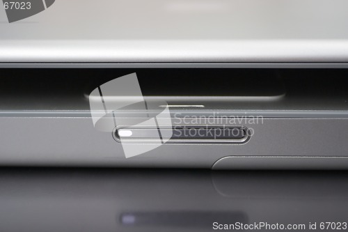 Image of Notebook Computer Detail Reflected