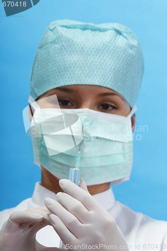Image of Nurse holding a syringe