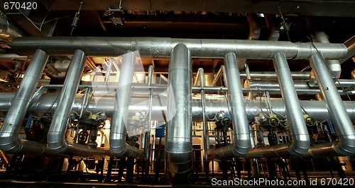 Image of Equipment, cables and piping as found inside of a modern industr