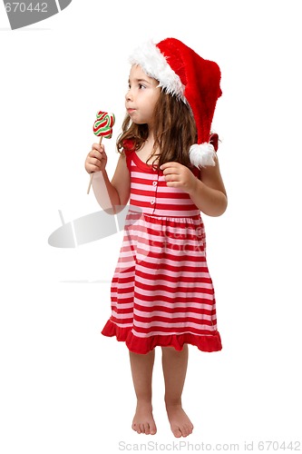 Image of Christmas girl with candy