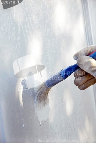 Image of Painting wooden door