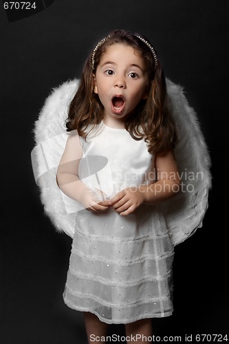 Image of Angel singing carols or worship