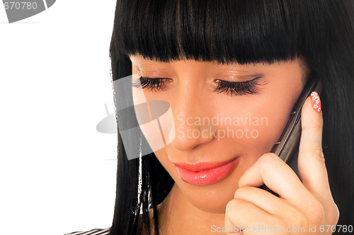 Image of Portrait of the pretty girl speaking on the phone