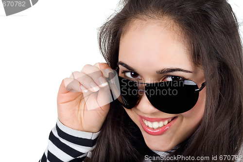 Image of Portrait of the smiling girl in sunglasses