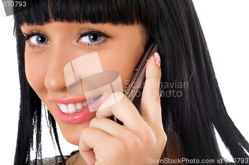 Image of Portrait of the smiling girl speaking on the phone