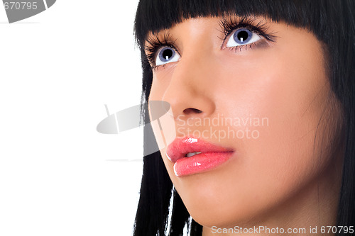 Image of Portrait of the lovely girl looking upwards