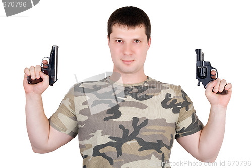 Image of Young man with a two pistol. Isolated