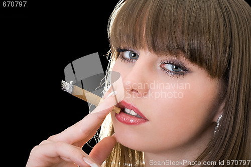 Image of Portrait of the pretty girl with a cigar