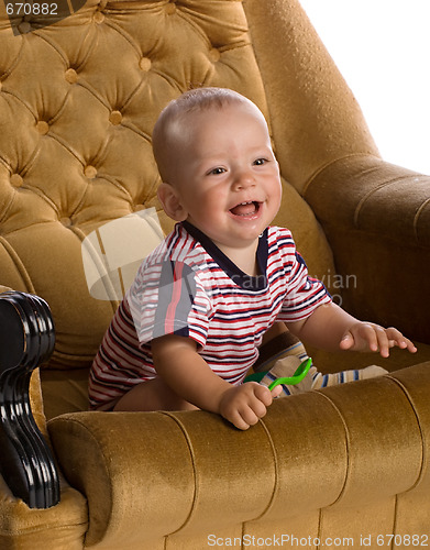Image of baby in big armchair