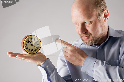 Image of man with clock