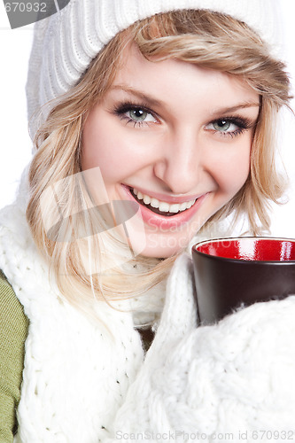 Image of Beautiful woman holding coffee cup