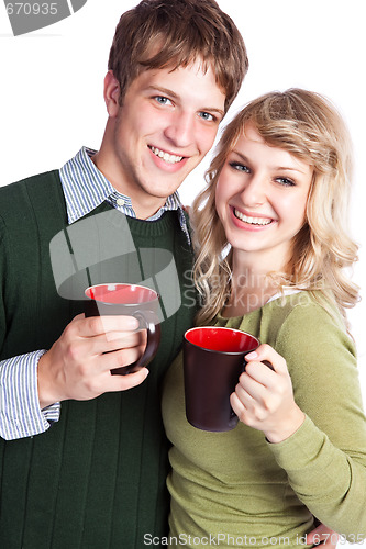 Image of Caucasian couple holding coffee cups