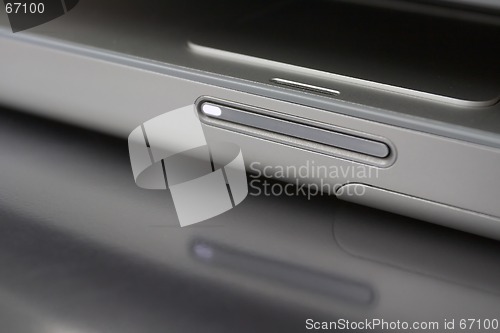 Image of Notebook Computer Detail Reflected