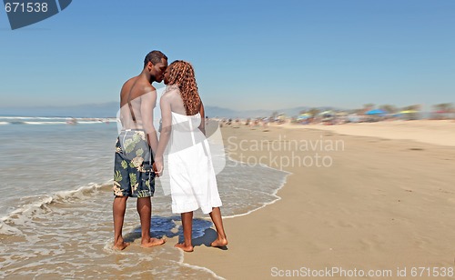 Image of Happy Loving African American Couple Kissing on the Beach