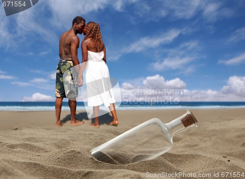 Image of Beautiful Beach With Corked Bottle