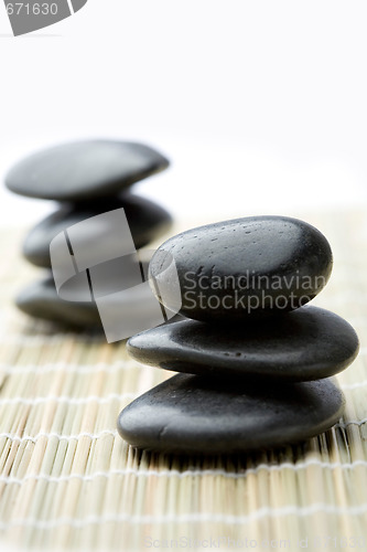 Image of Stacks of black stones.