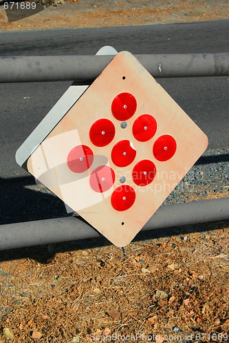 Image of Reflectors on a Caution Sign