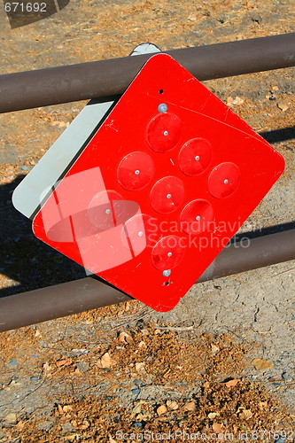 Image of Reflectors on a Caution Sign