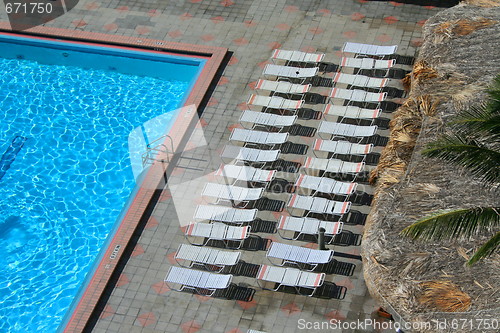 Image of Swimming Pool and Lounge Chairs