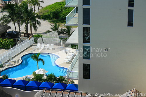 Image of Swimming Pool and Lounge Chairs